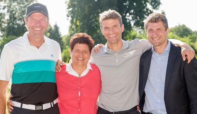 Klaudia Muller with her husband, Gerhard Muller, and sons, Thomas Muller and Simon Muller.